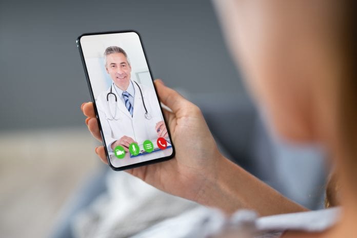 patient and doctor use telehealth