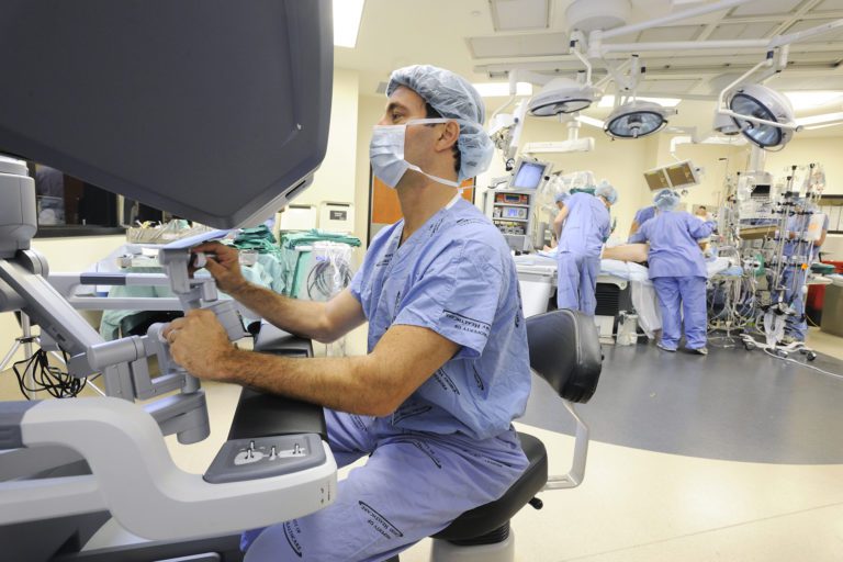 dr michael halkos performing robotic heart surgery