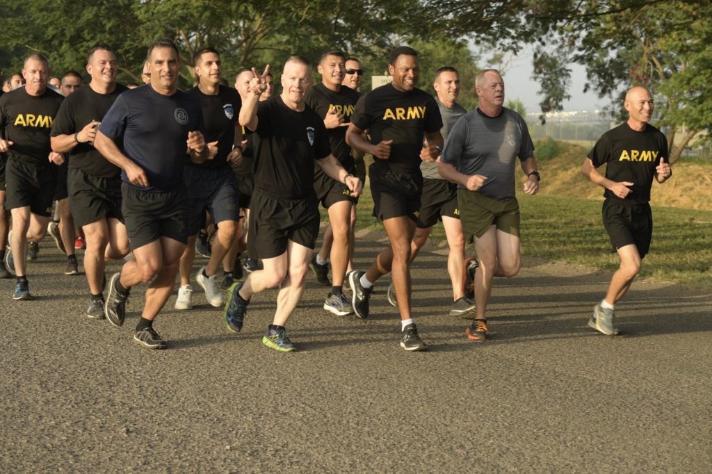 john troxall running with army service members