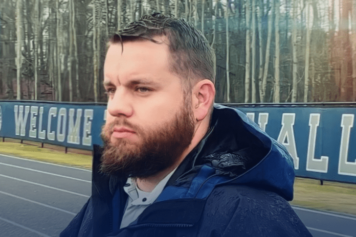 closeup of emory healthcare athletic trainer chris carruth at high school soccer game